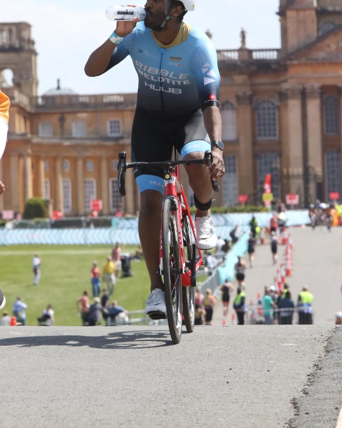 Abraham Spring hydrating during the Blenheim Palace Triathlon