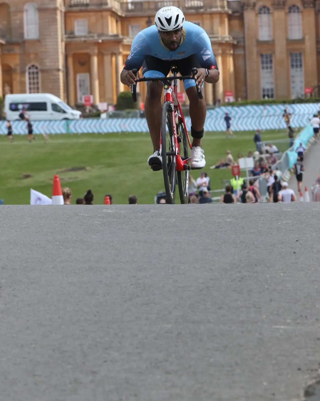 Abraham Spring climbing on the bike at Blenheim Palace